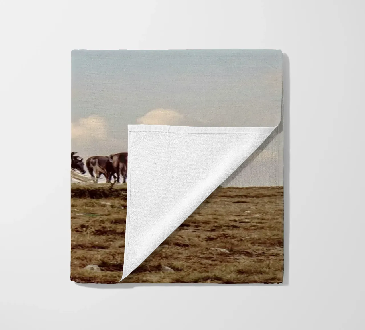 herd horses pasture beach towel by Horsire