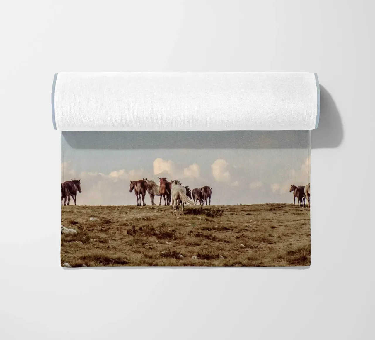 herd horses pasture beach towel by Horsire