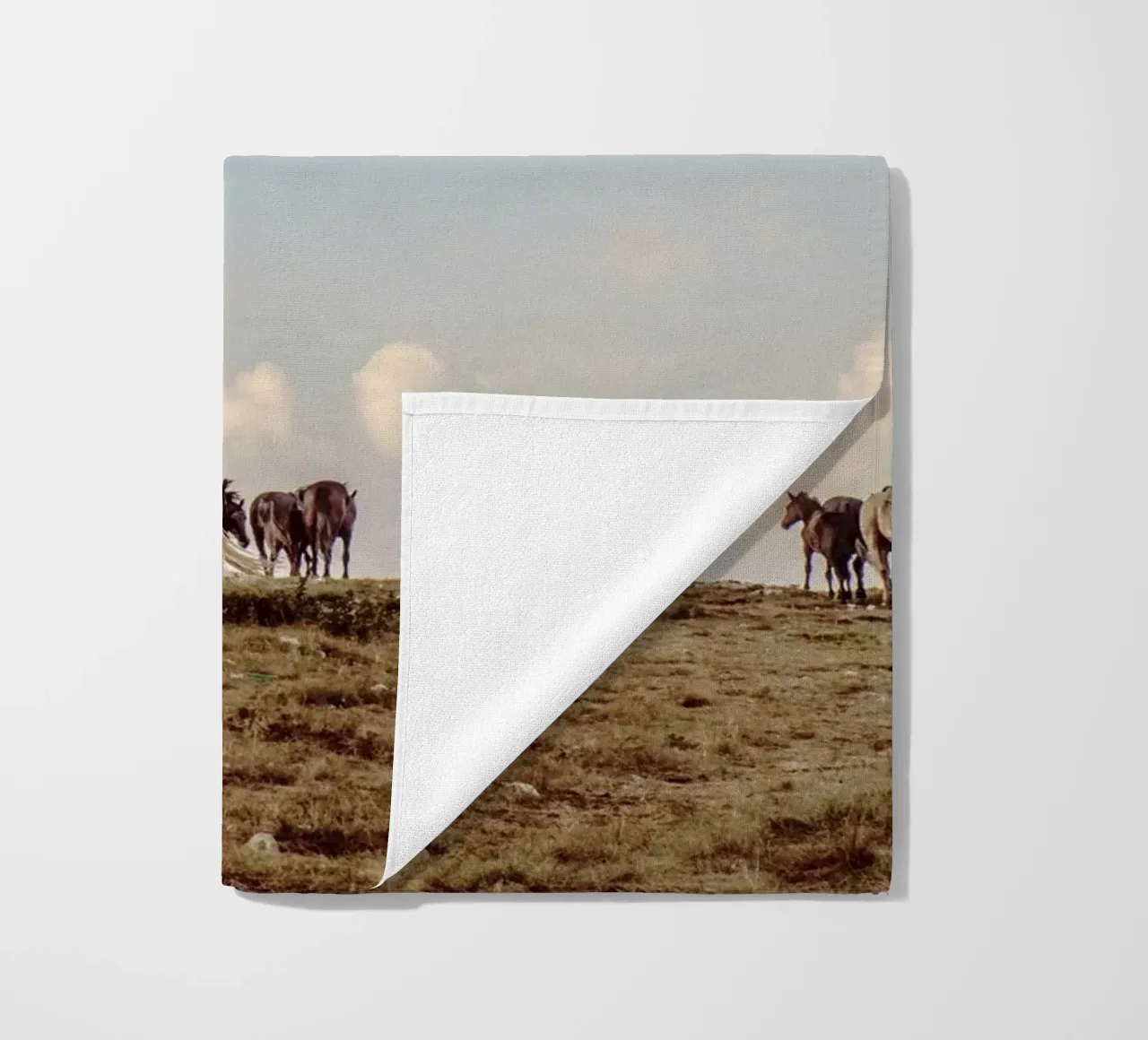 herd horses pasture beach towel by Horsire