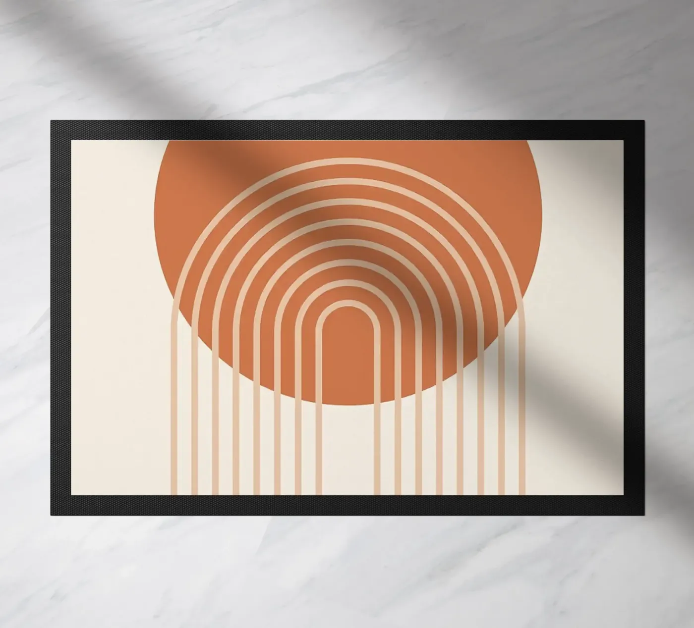 circle half-circle doormat by Ron Bale