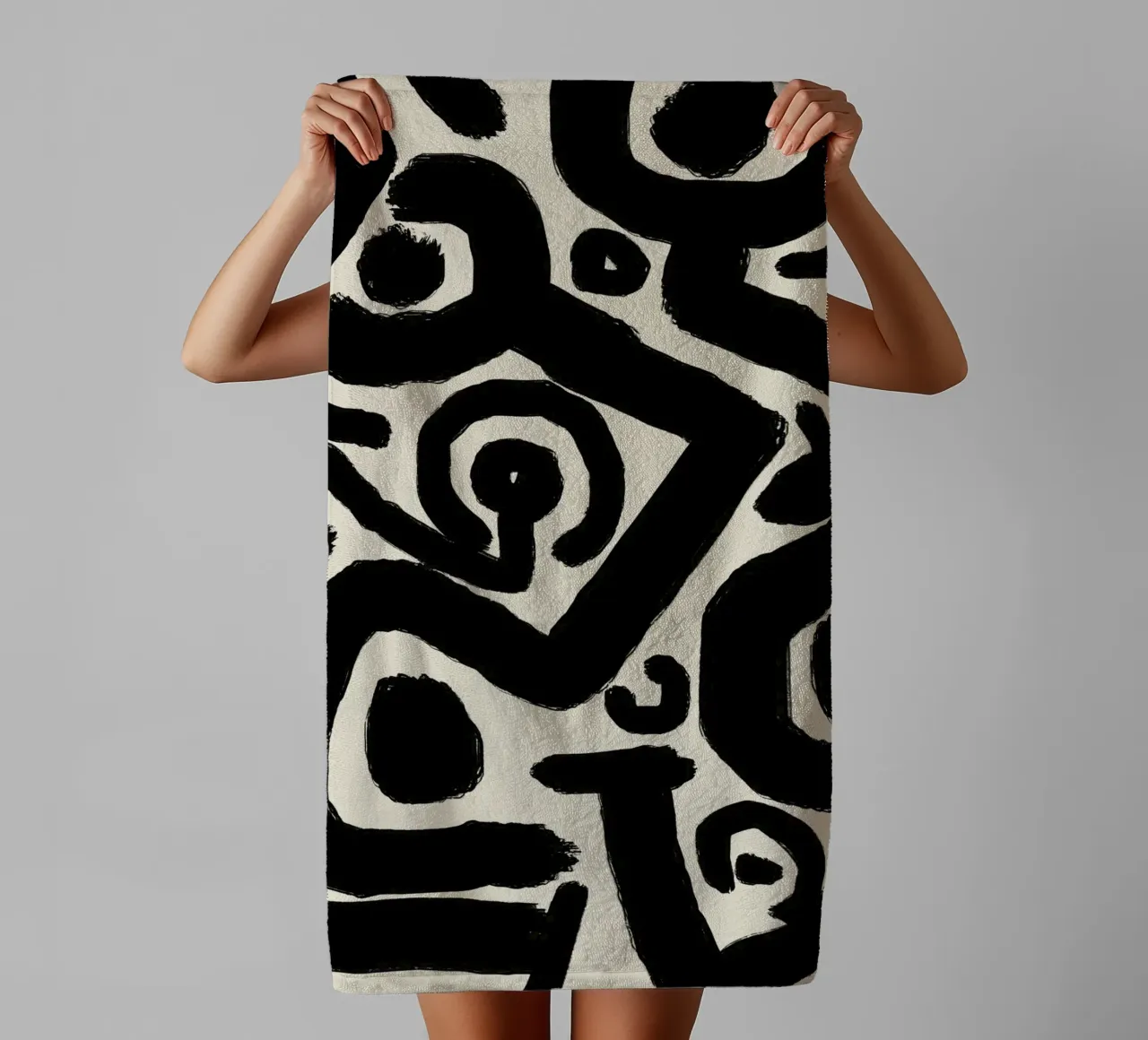 Bold black abstract towel by Little Dean