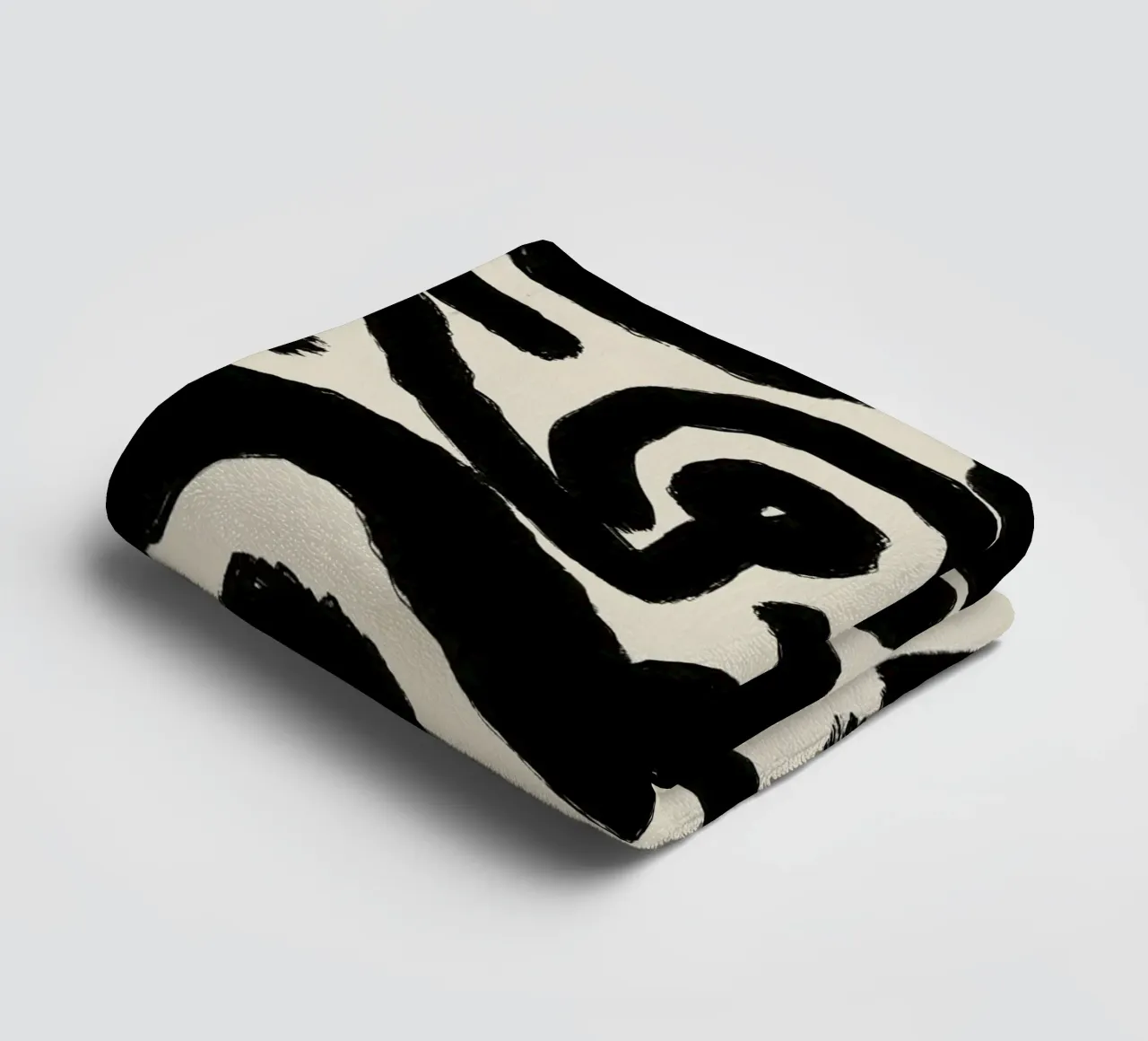 Bold black abstract towel by Little Dean