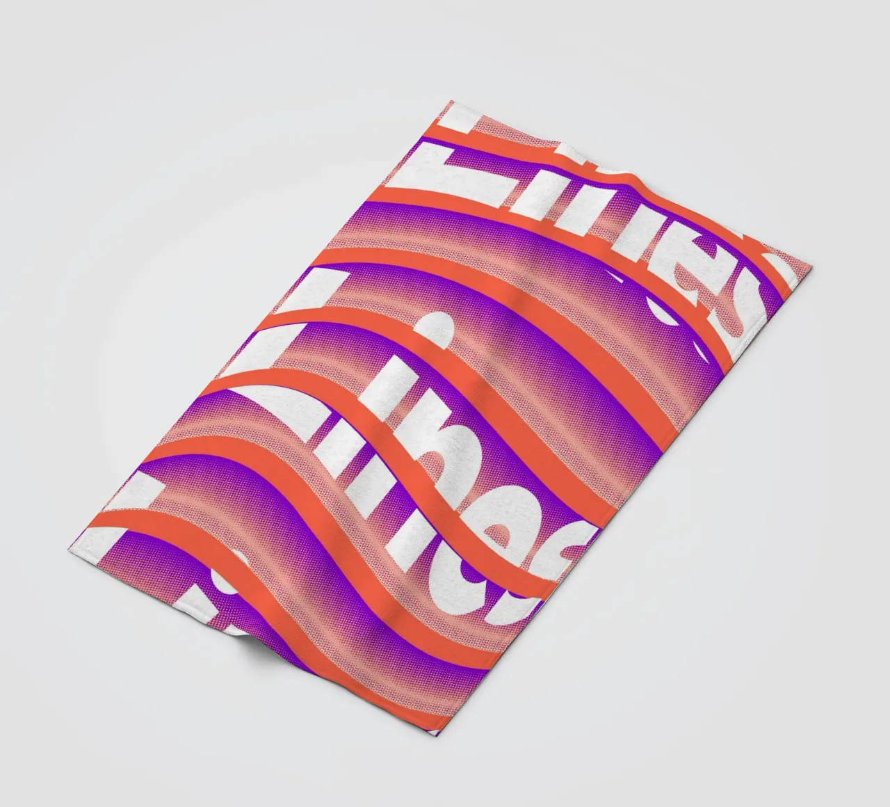 Typographic distortion in an undulating rhythm fleece blanket by Sarah Mauriaucourt