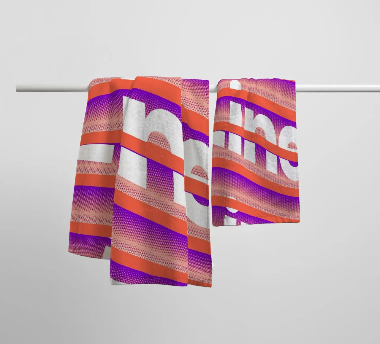 Typographic distortion in an undulating rhythm towel by Sarah Mauriaucourt