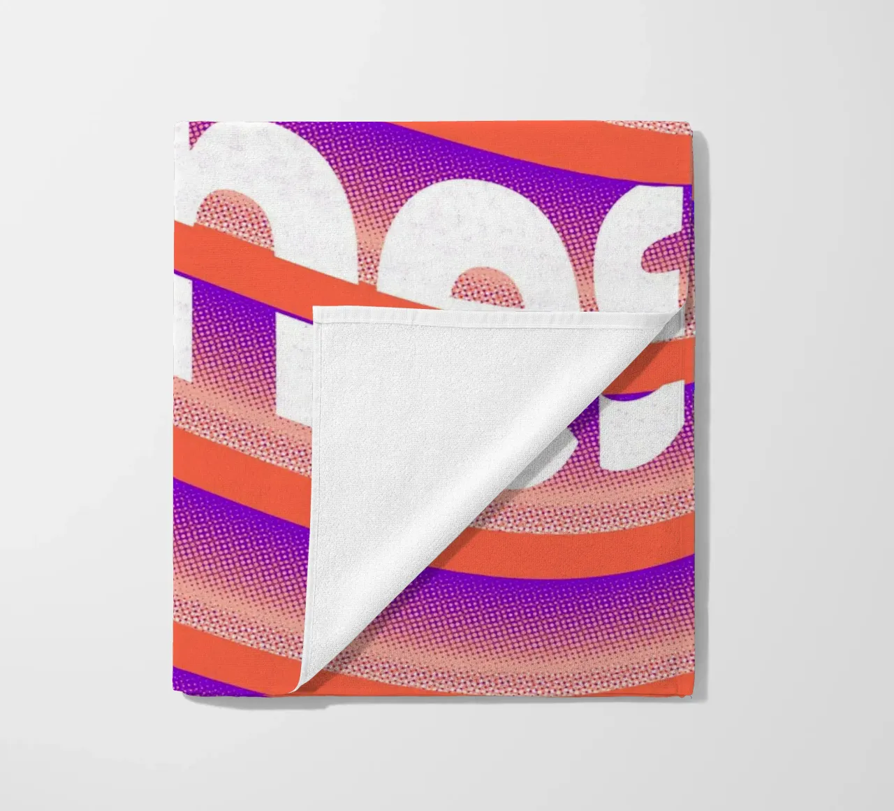 Typographic distortion in an undulating rhythm beach towel by Sarah Mauriaucourt