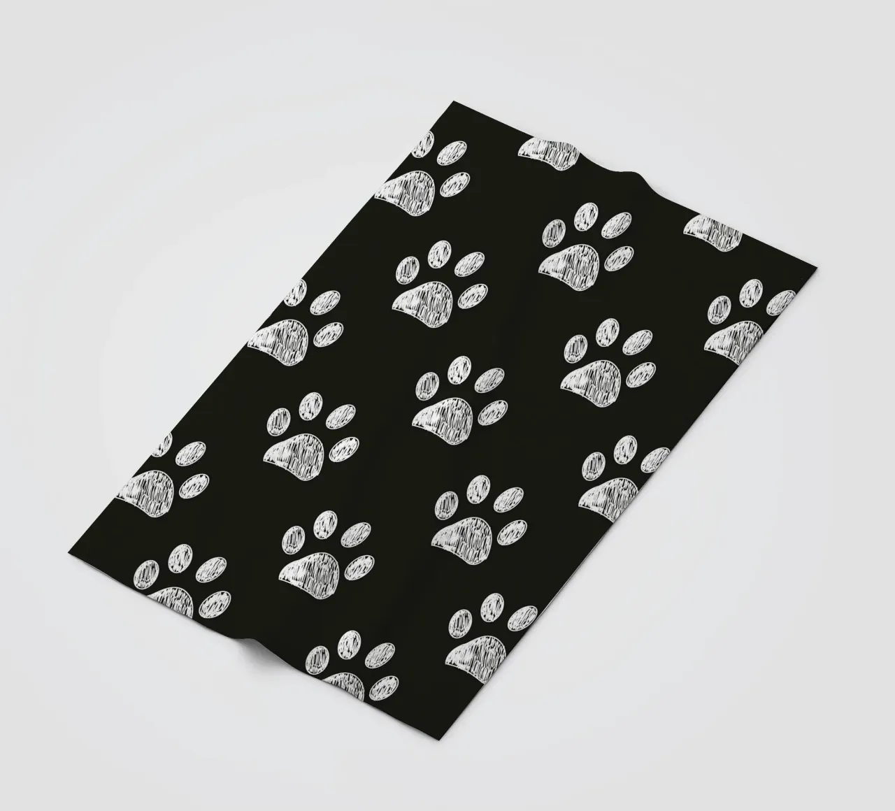 White paw prints black background pattern fleece blanket by gulsengunel