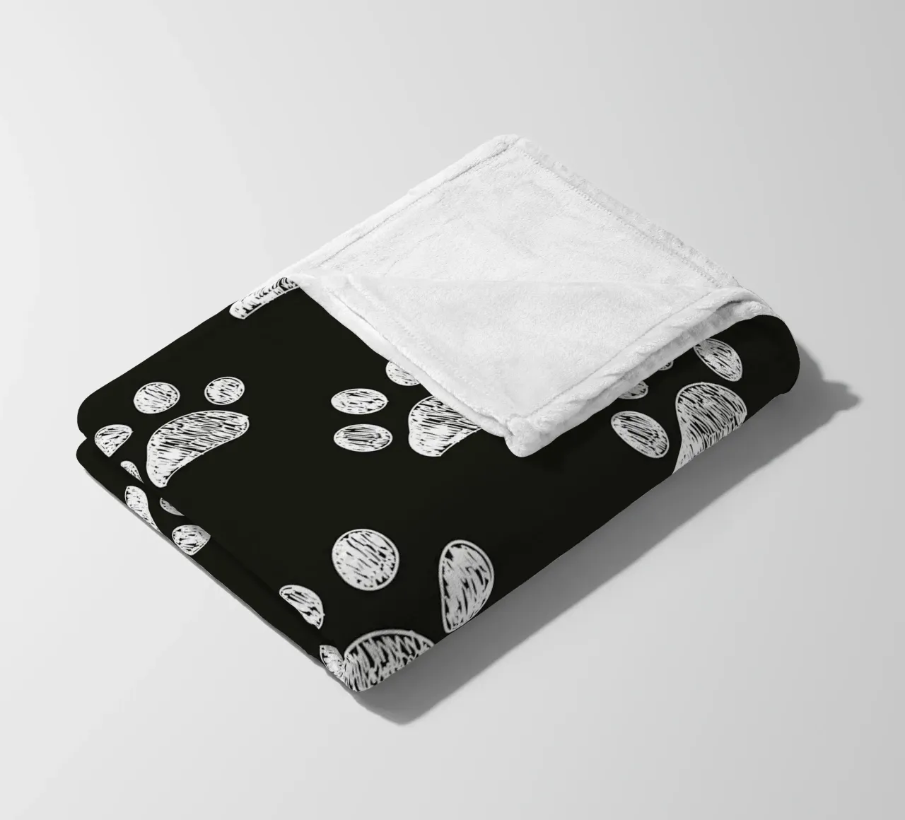 White paw prints black background pattern fleece blanket by gulsengunel