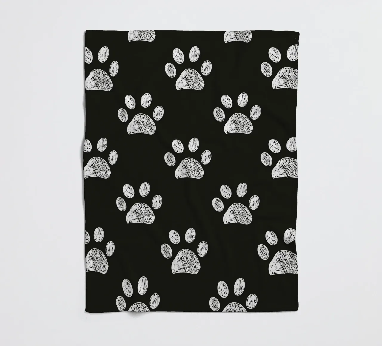 White paw prints black background pattern fleece blanket by gulsengunel