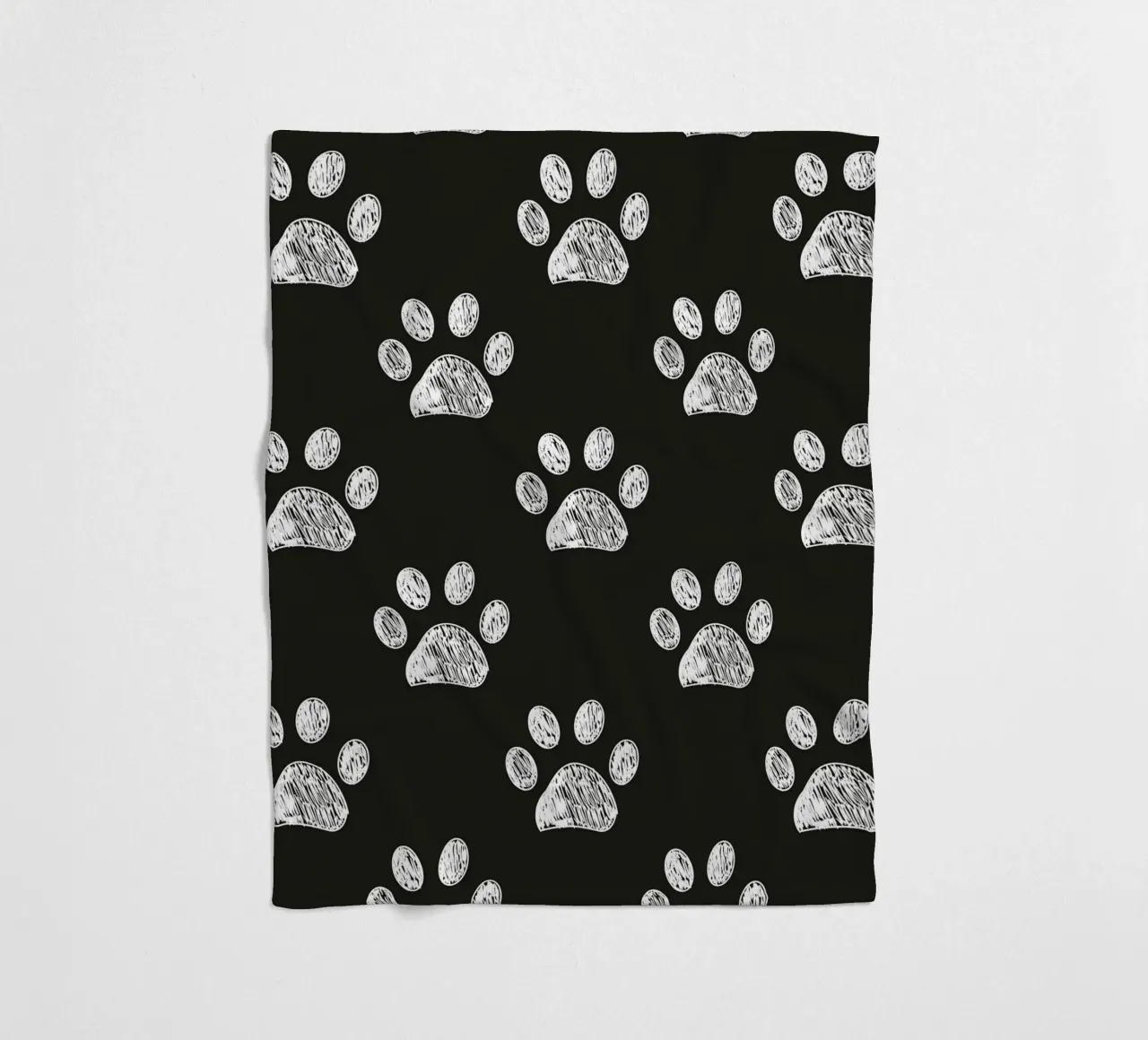 White paw prints black background pattern fleece blanket by gulsengunel