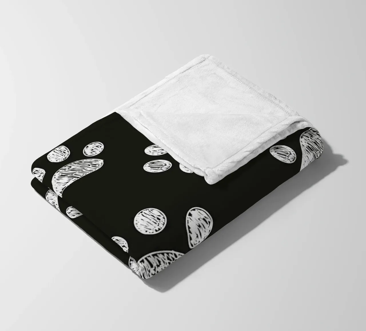 White paw prints black background pattern fleece blanket by gulsengunel