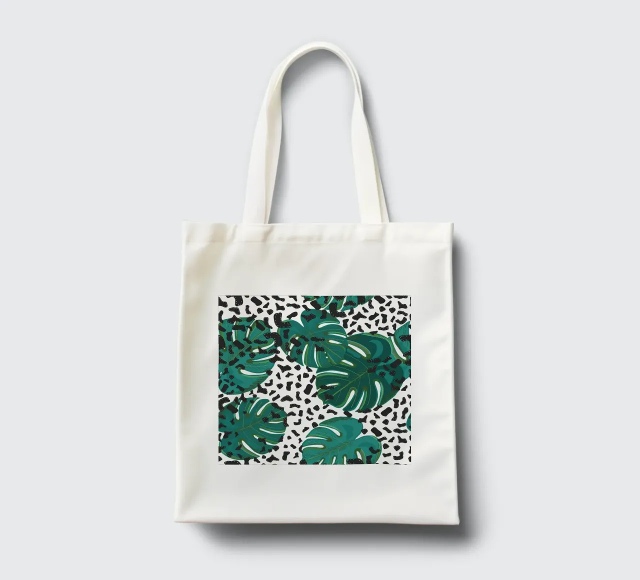 Monstera leaves with leopard print pattern tote bag by gulsengunel