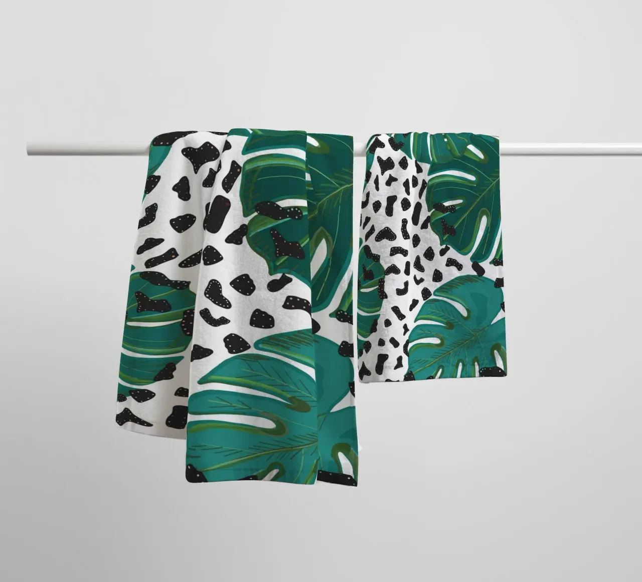 Monstera leaves with leopard print pattern towel by gulsengunel