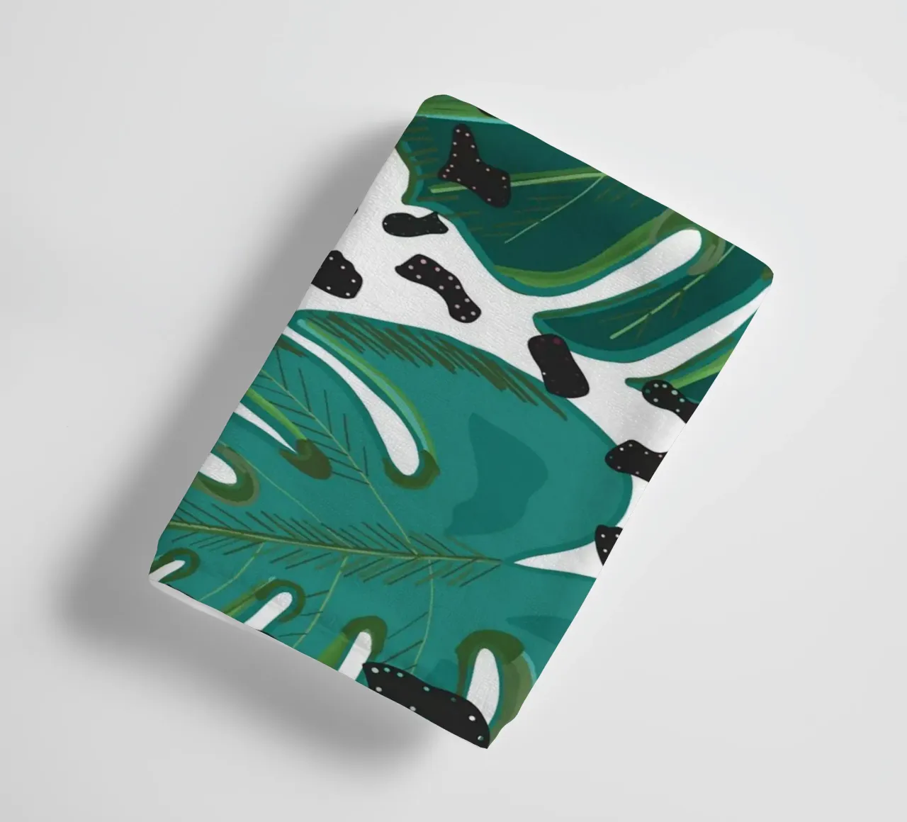 Monstera leaves with leopard print pattern towel by gulsengunel