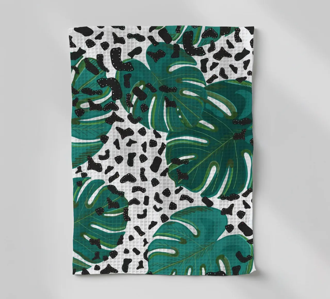 Monstera leaves with leopard print pattern tea towel by gulsengunel