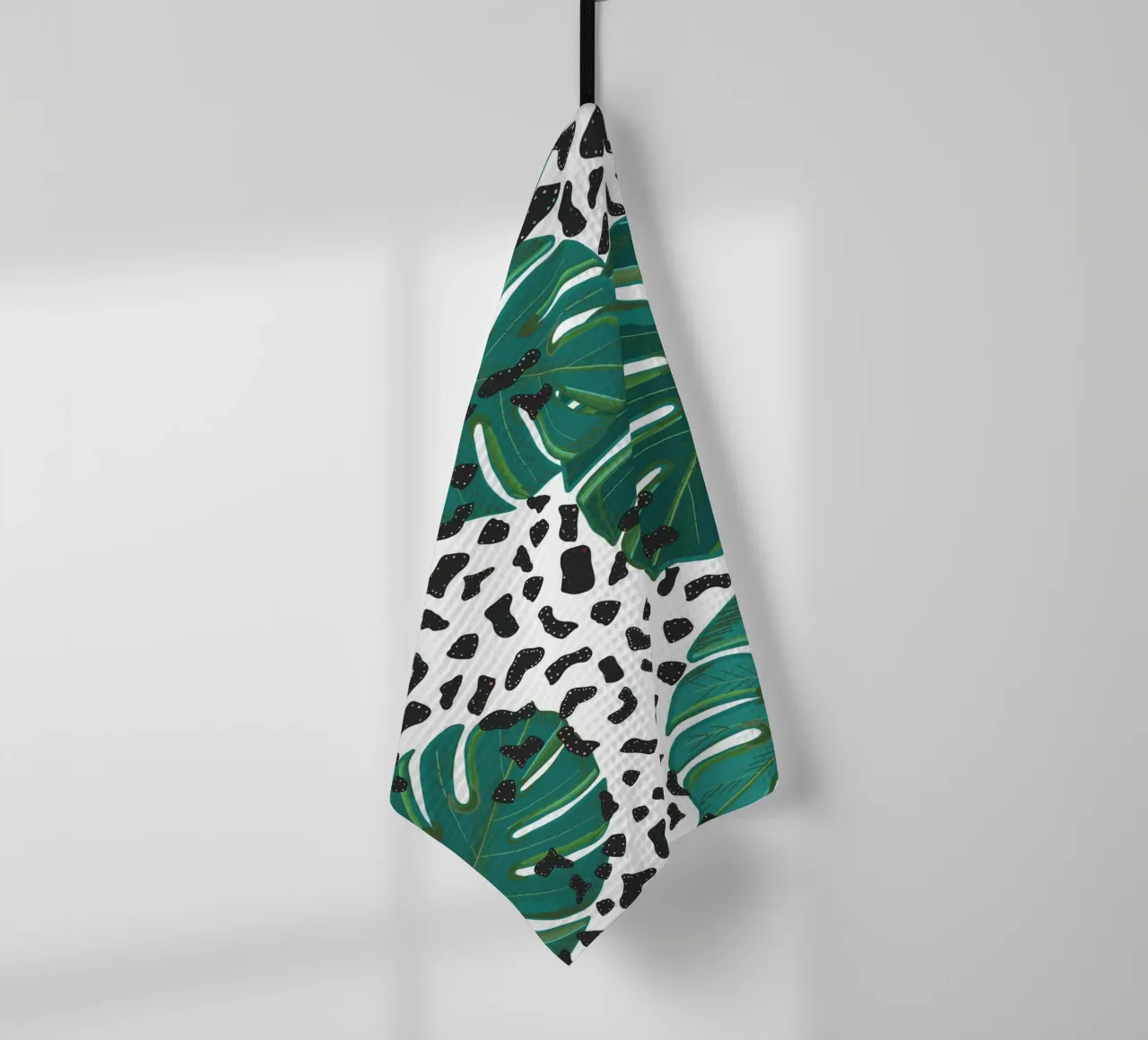 Monstera leaves with leopard print pattern tea towel by gulsengunel