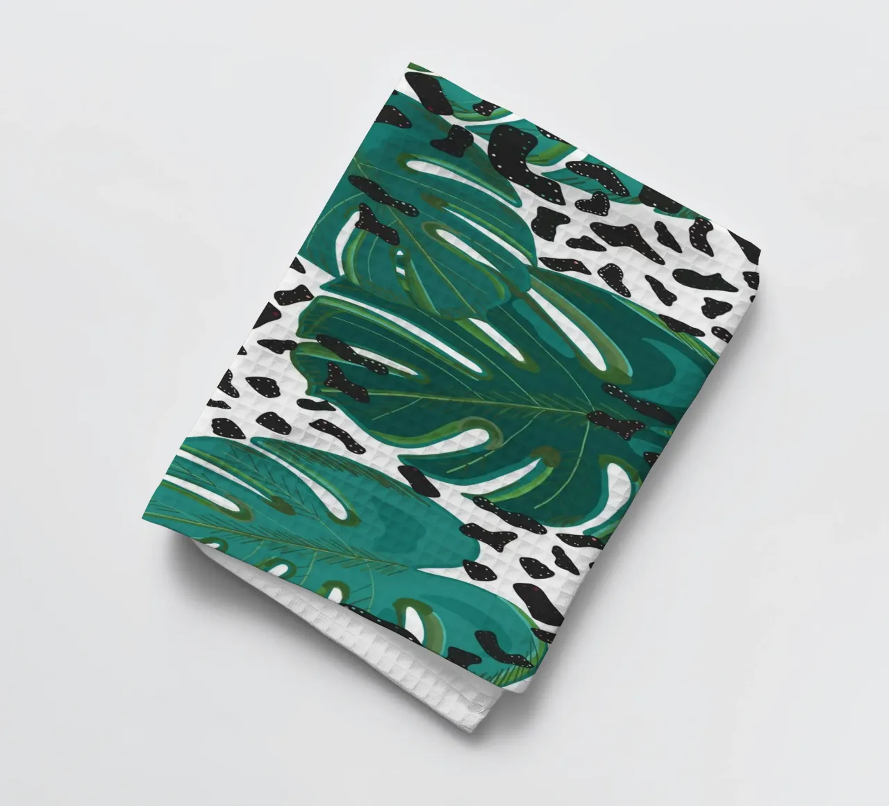 Monstera leaves with leopard print pattern tea towel by gulsengunel