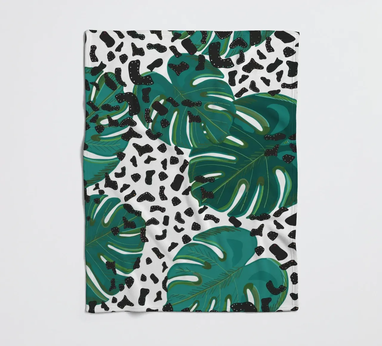 Monstera leaves with leopard print pattern fleece blanket by gulsengunel