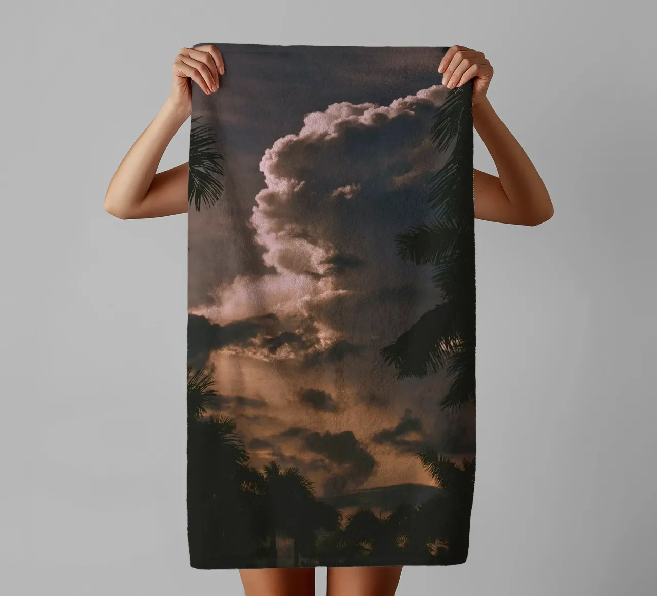 clouds in sunset with palm trees towel by home of clouds
