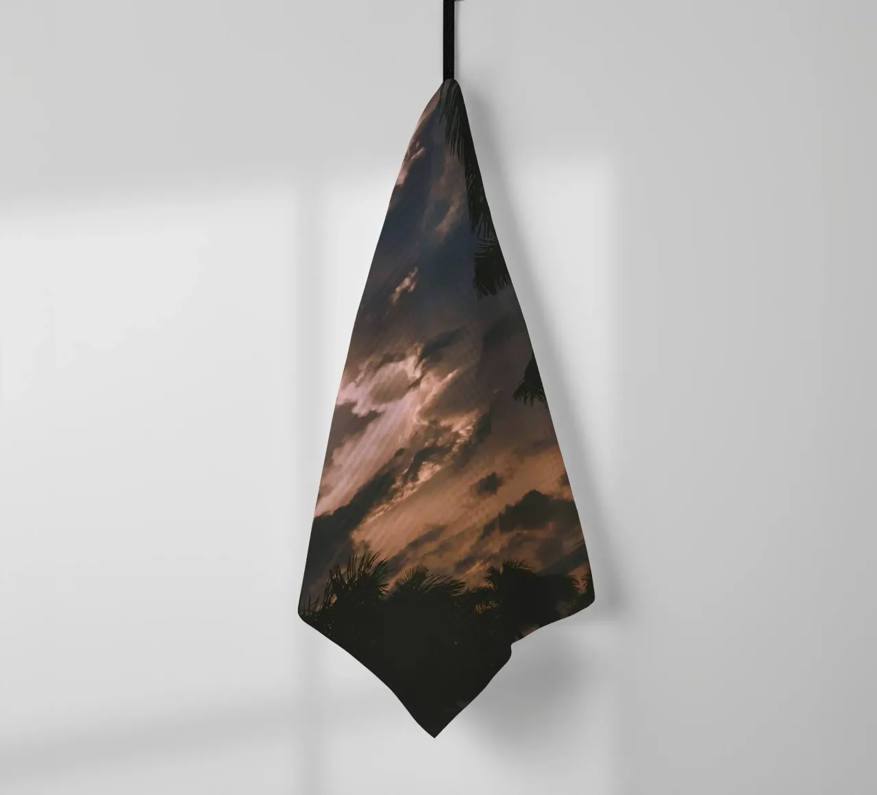 clouds in sunset with palm trees tea towel by home of clouds