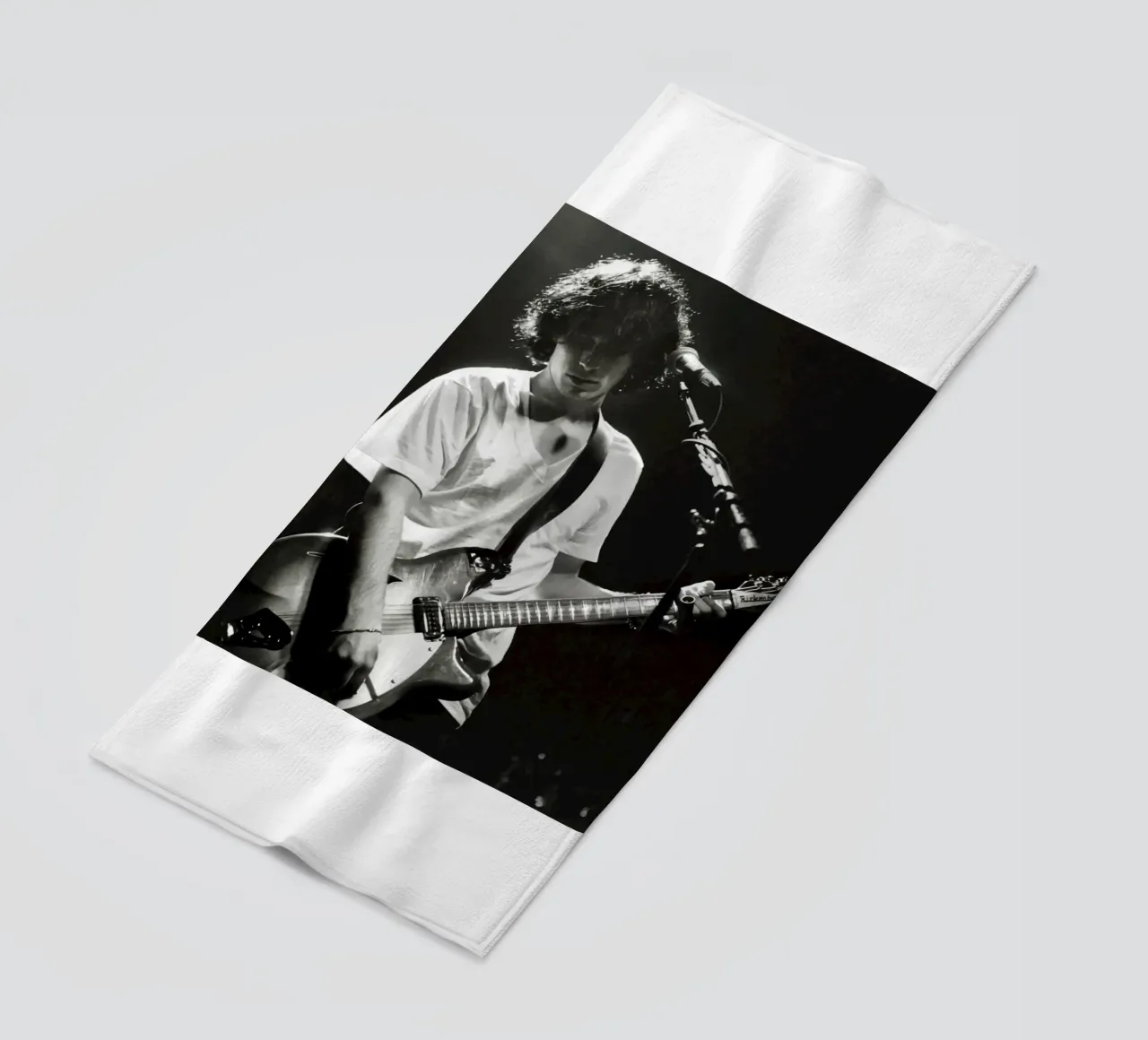 Concert Guitaris Jeff Buckley beach towel by greskulargenama