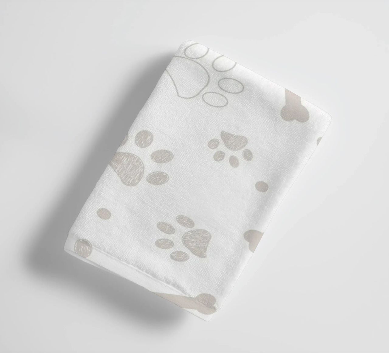 Grey paw and bones pattern towel by gulsengunel