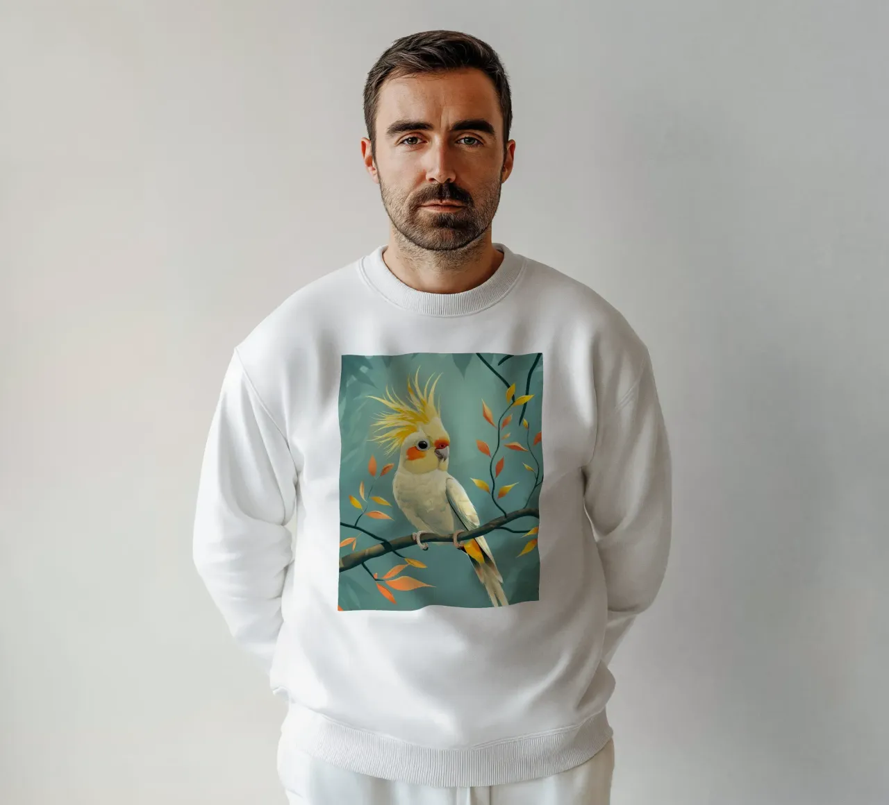 Cacatua giallo pallido su un ramo con fogliame autunnale felpa da DesignDoodle