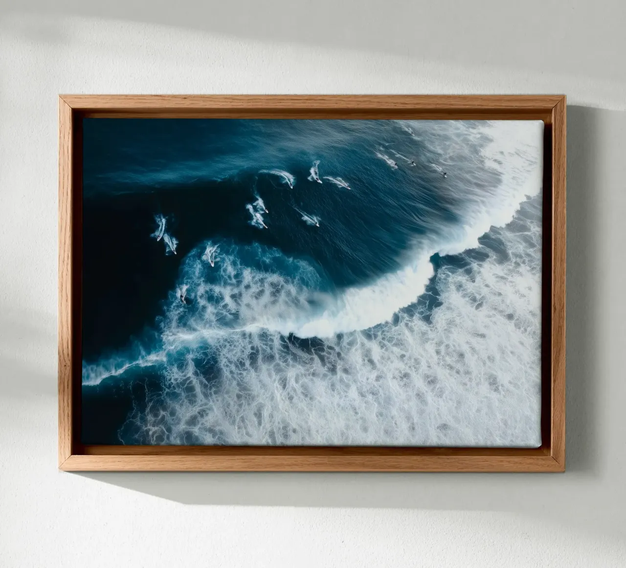 Aerial Surf Print - Surfers Riding Big Ocean Waves canvas with Floater frame by Nadjaa