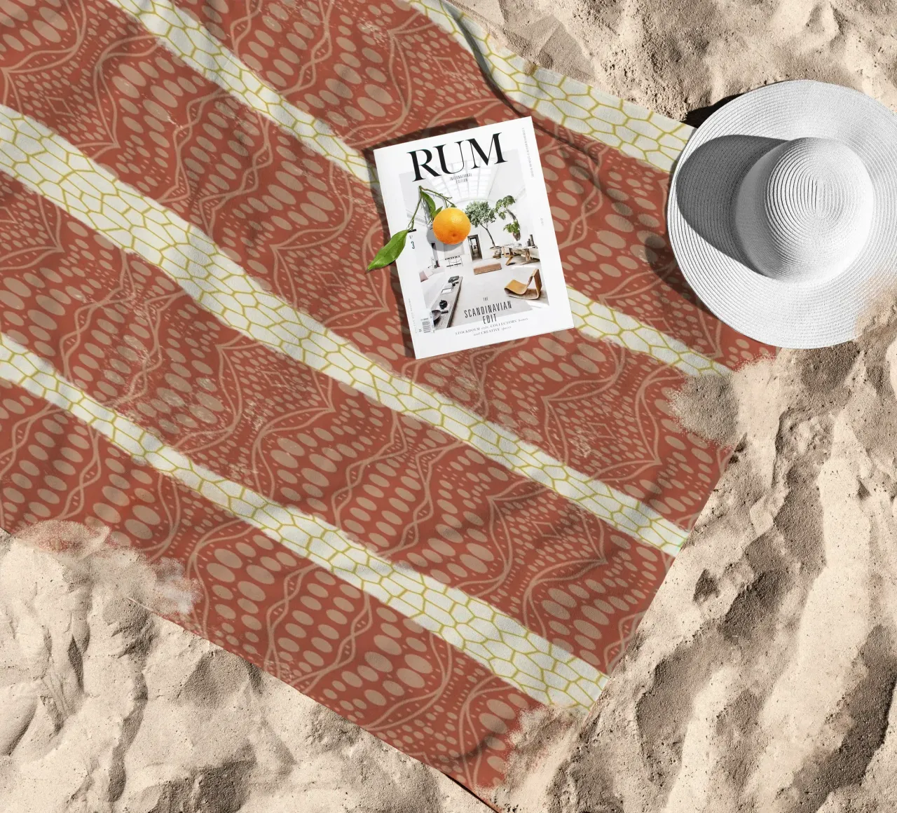 Carta patterned telo mare da Little Dean