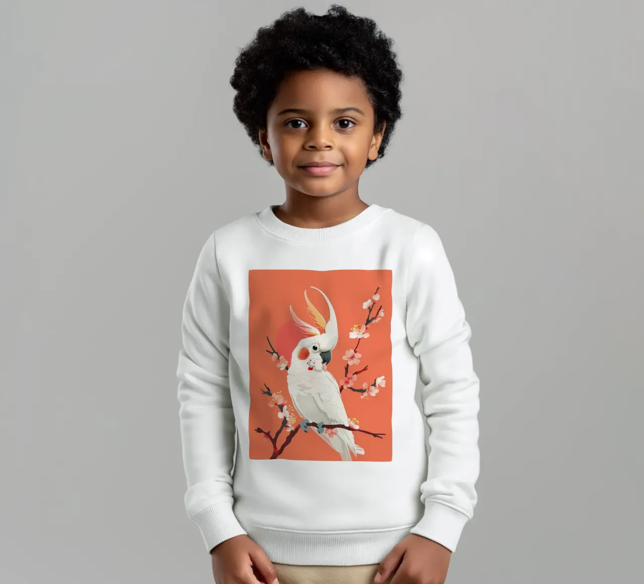 Cacatua su ramo con fiori illustrazione felpa bambino da DesignDoodle