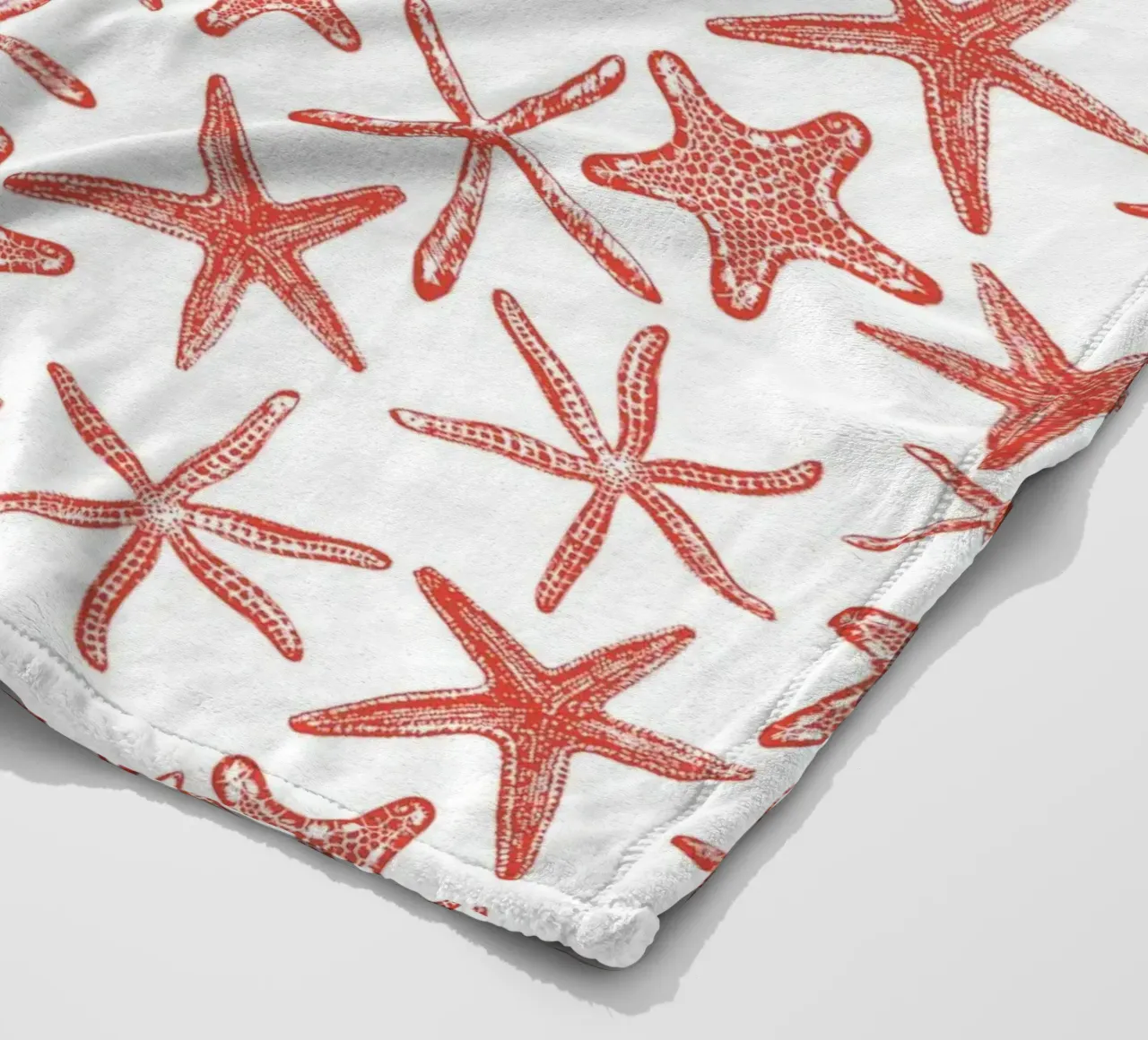 SSea stars in red fleece blanket by Painted Nature
