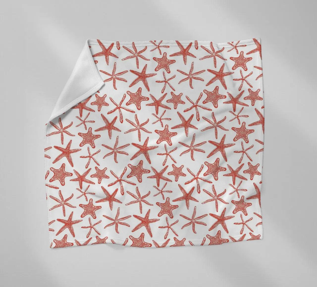 SSea stars in red fleece blanket by Painted Nature