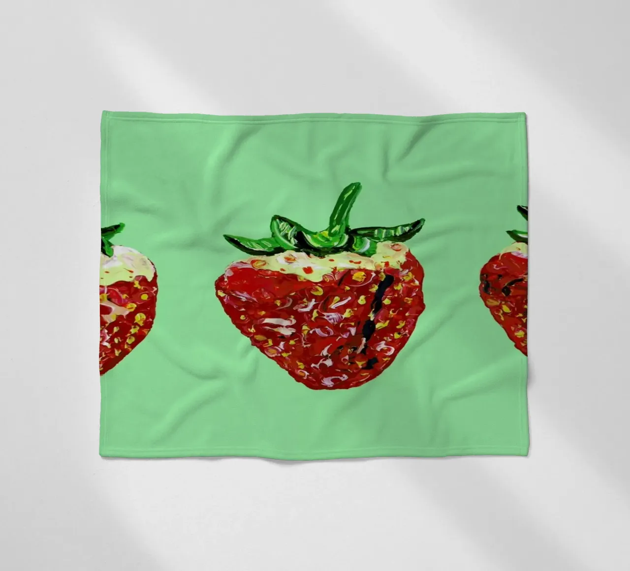 Strawberries fleece blanket by Alice Straker