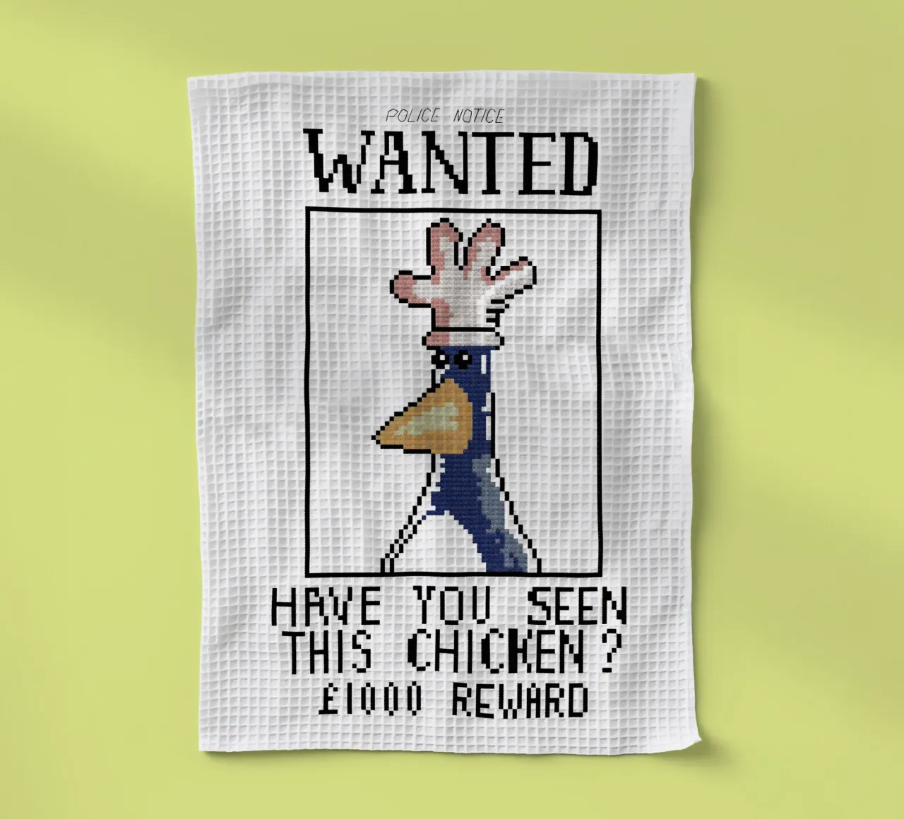 Feathers McGraw Wanted V1 tea towel by vantobbin