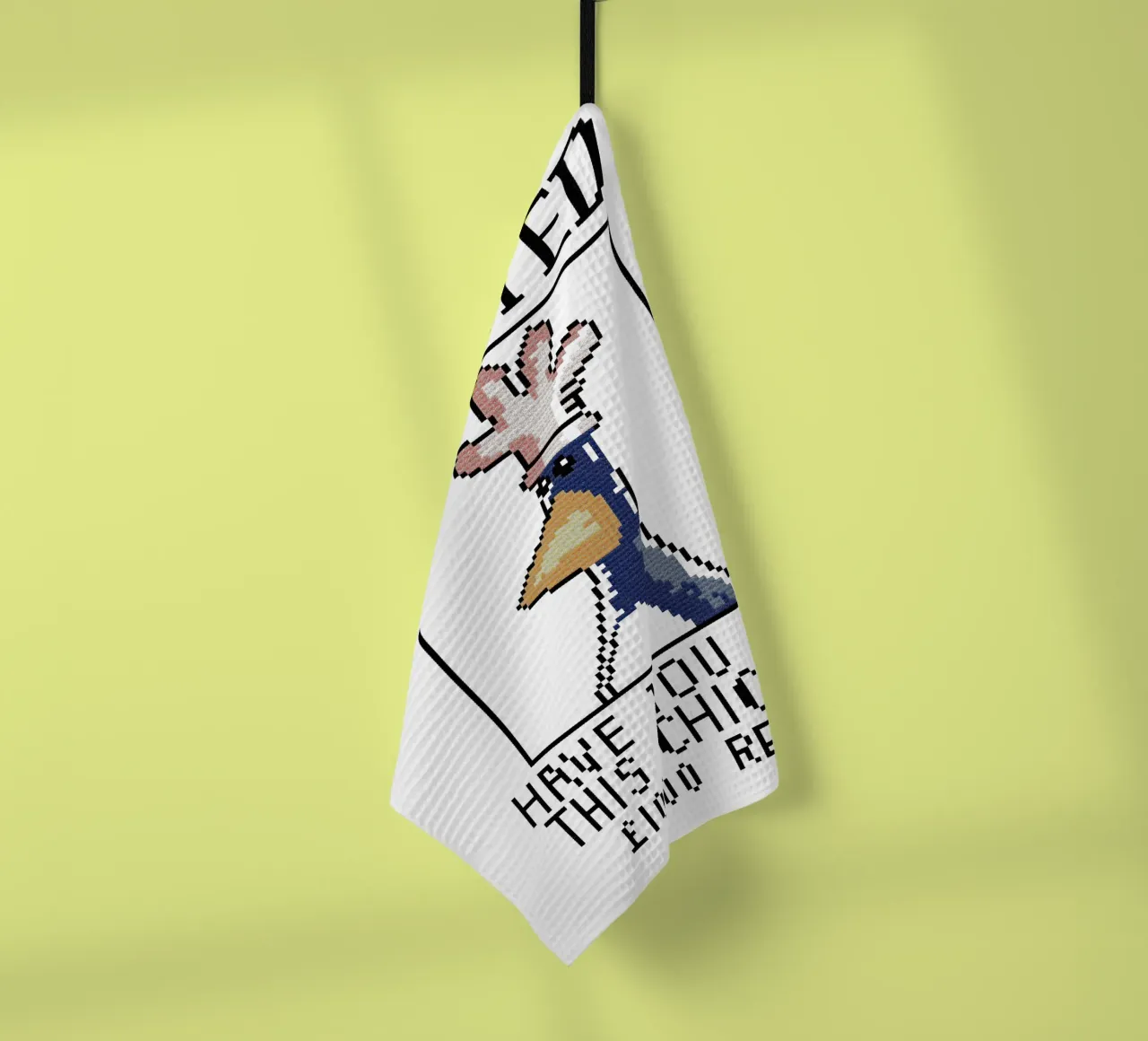 Feathers McGraw Wanted V1 tea towel by vantobbin