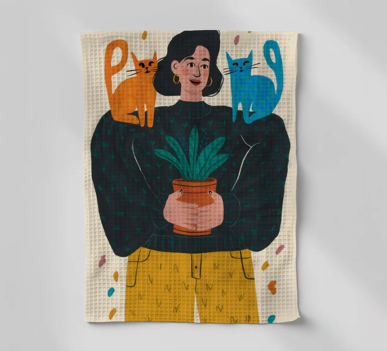 Donna che tiene in mano un vaso per piante canovaccio da cucina da Marigold Tiga