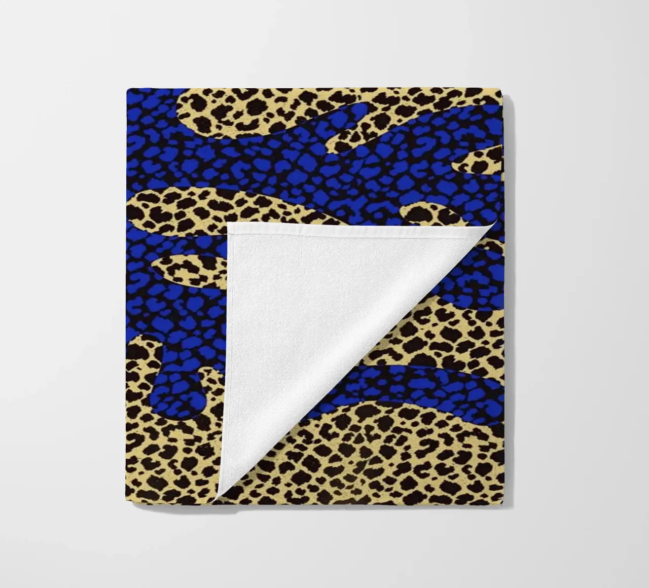 Tiled blue coral beach towel by Little Dean