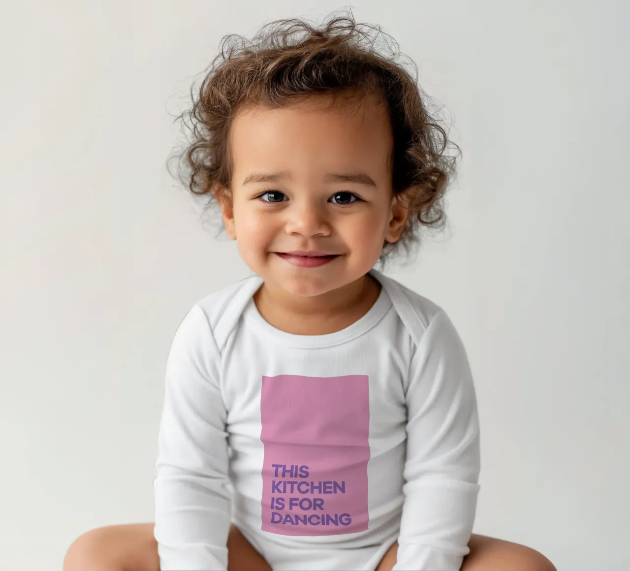 This Kitchen is for Dancing Purple long-sleeve baby romper by Pure