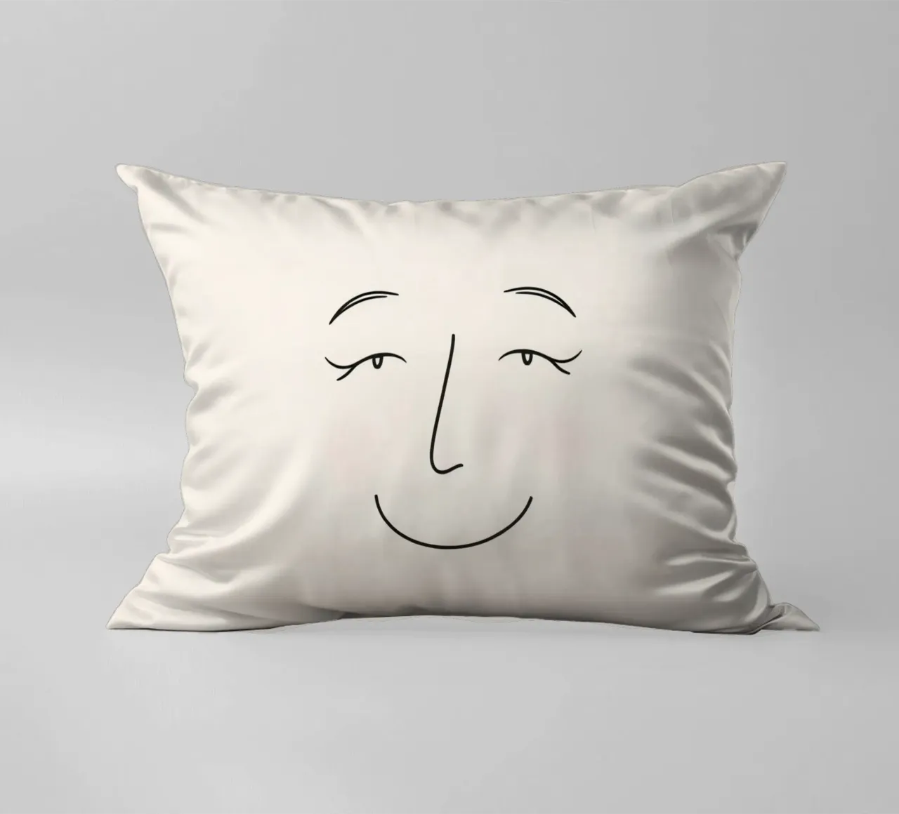 Simple line drawing shows a smiling face with blushed cheek decorative cushion by DesignDoodle