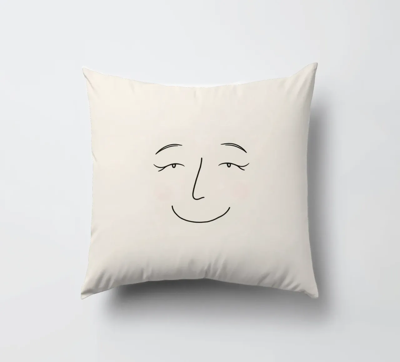 Simple line drawing shows a smiling face with blushed cheek decorative cushion by DesignDoodle