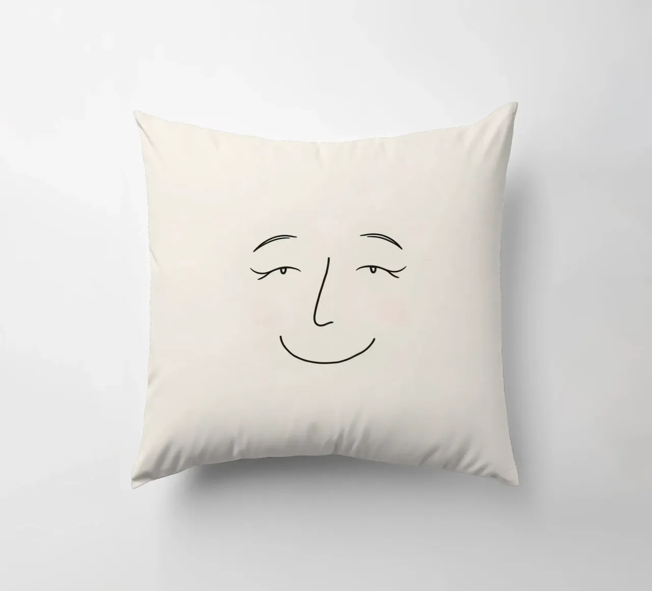 Simple line drawing shows a smiling face with blushed cheek decorative cushion by DesignDoodle