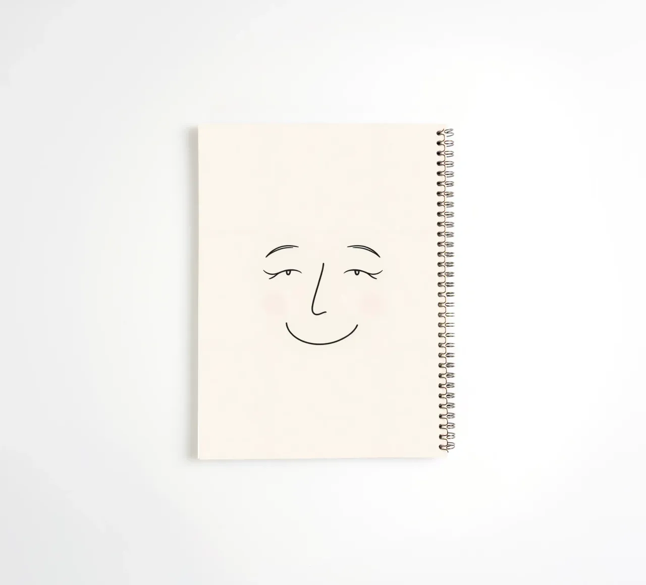 Simple line drawing shows a smiling face with blushed cheek spiral notebook by DesignDoodle