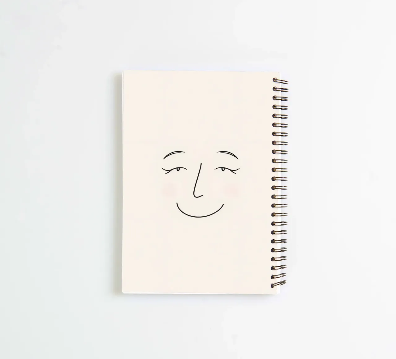 Simple line drawing shows a smiling face with blushed cheek spiral notebook by DesignDoodle
