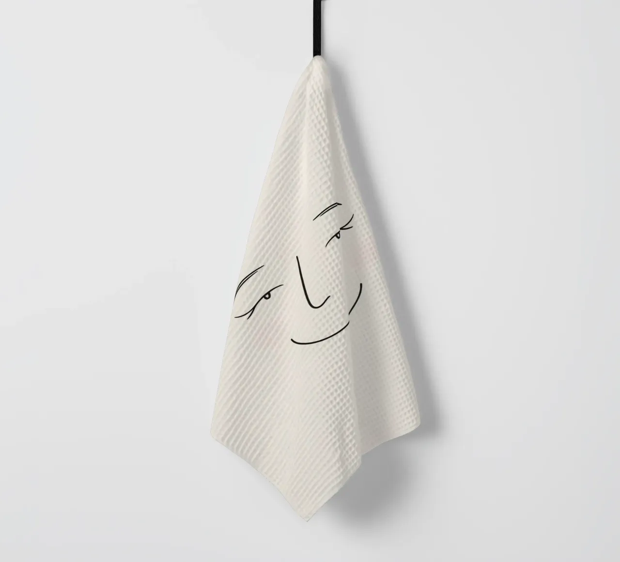 Simple line drawing shows a smiling face with blushed cheek tea towel by DesignDoodle