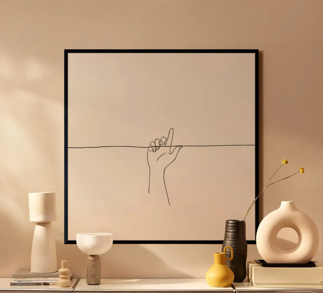 Outline of a hand with a finger grabbing thin black line carta hahnemühle da DesignDoodle