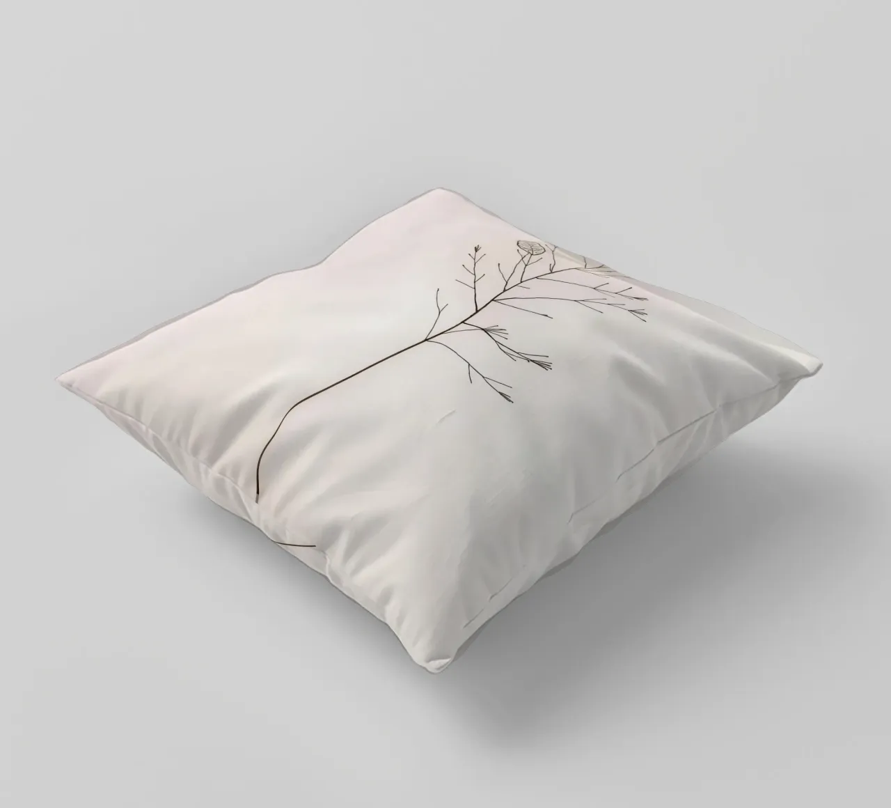 Single minimal botanical branch, displaying a leaf decorative cushion by DesignDoodle