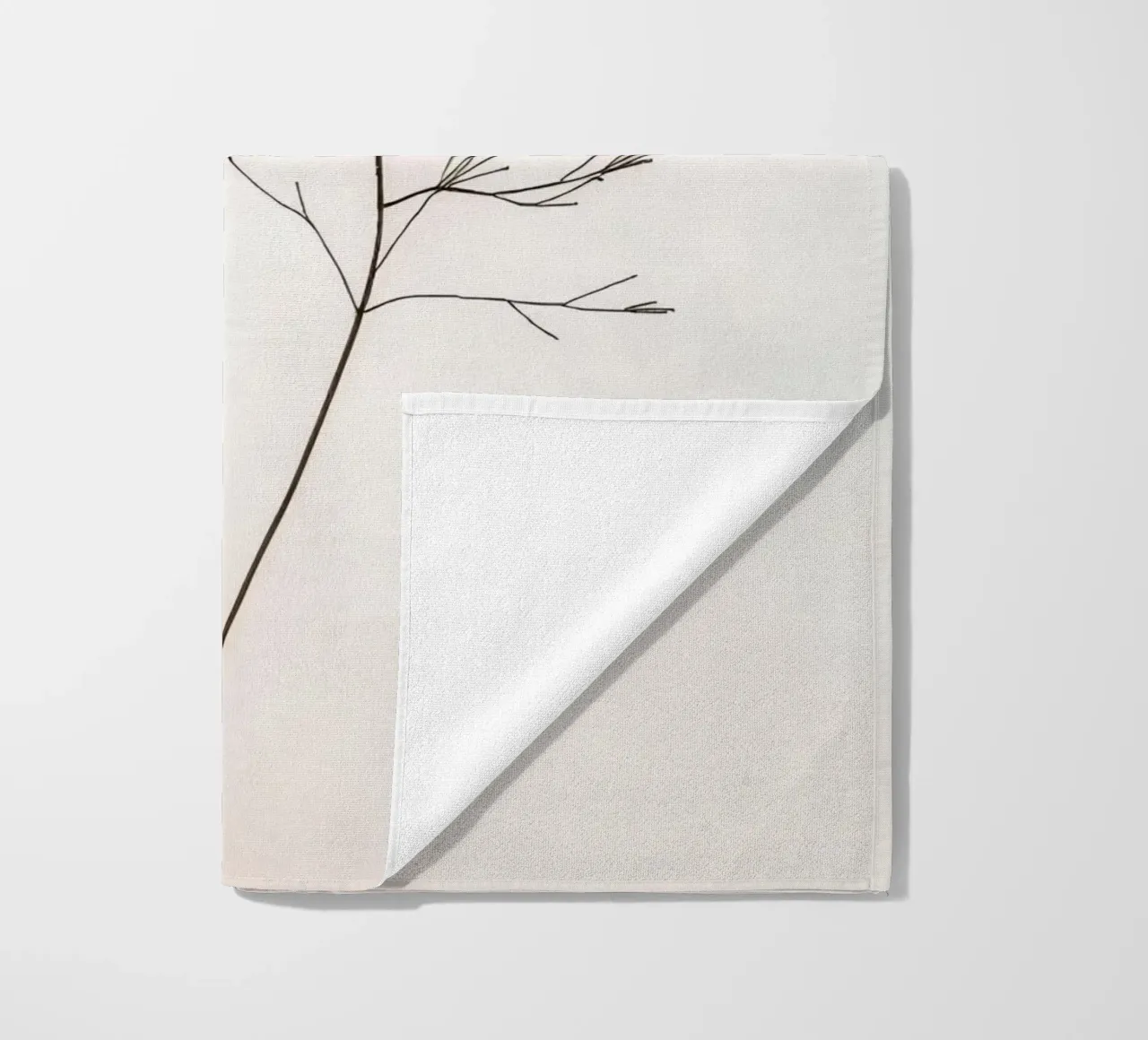 Single minimal botanical branch, displaying a leaf beach towel by DesignDoodle