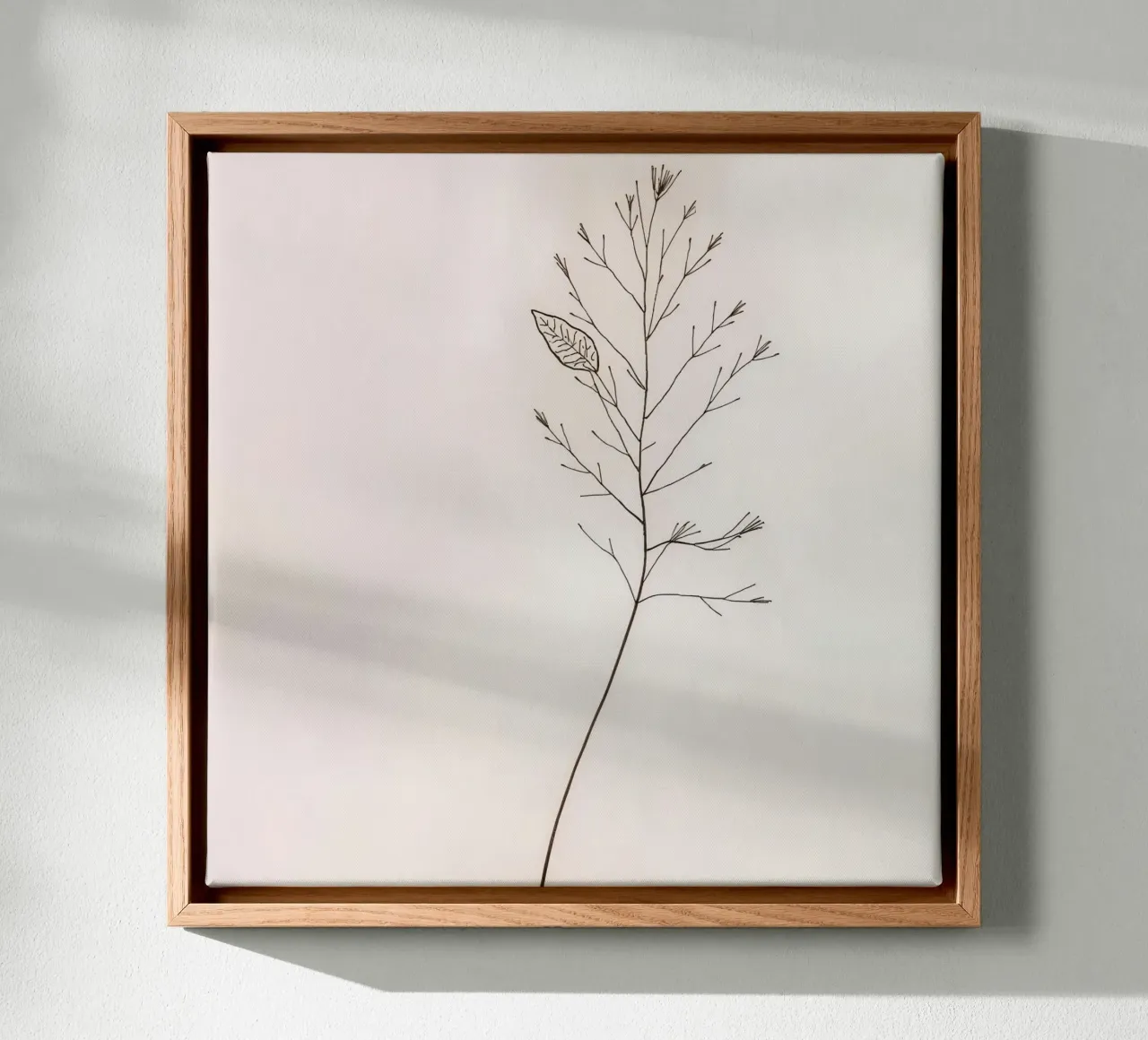 Single minimal botanical branch, displaying a leaf canvas by DesignDoodle
