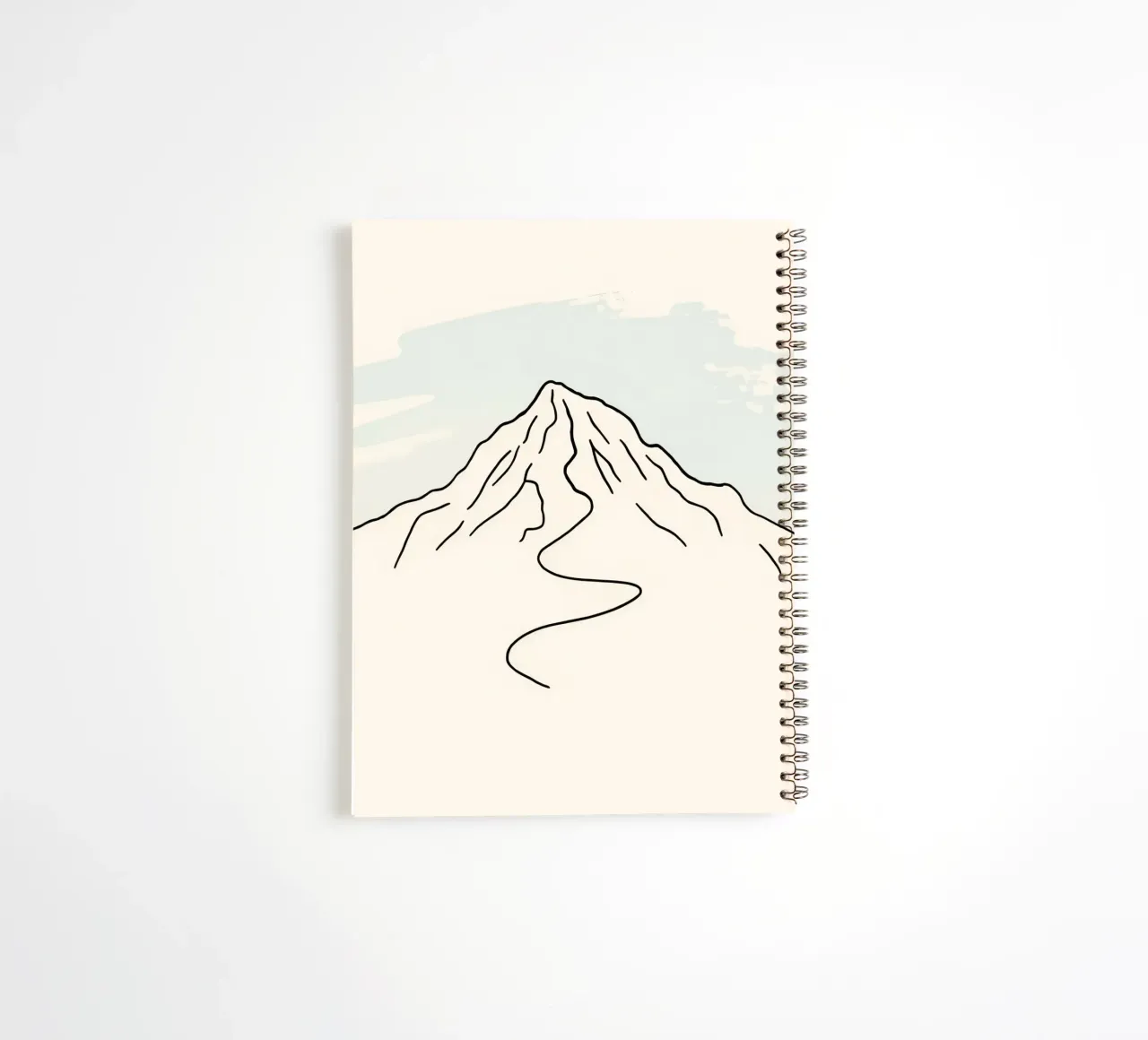 Mountain peak outline with winding trail under soft sky spiral notebook by DesignDoodle