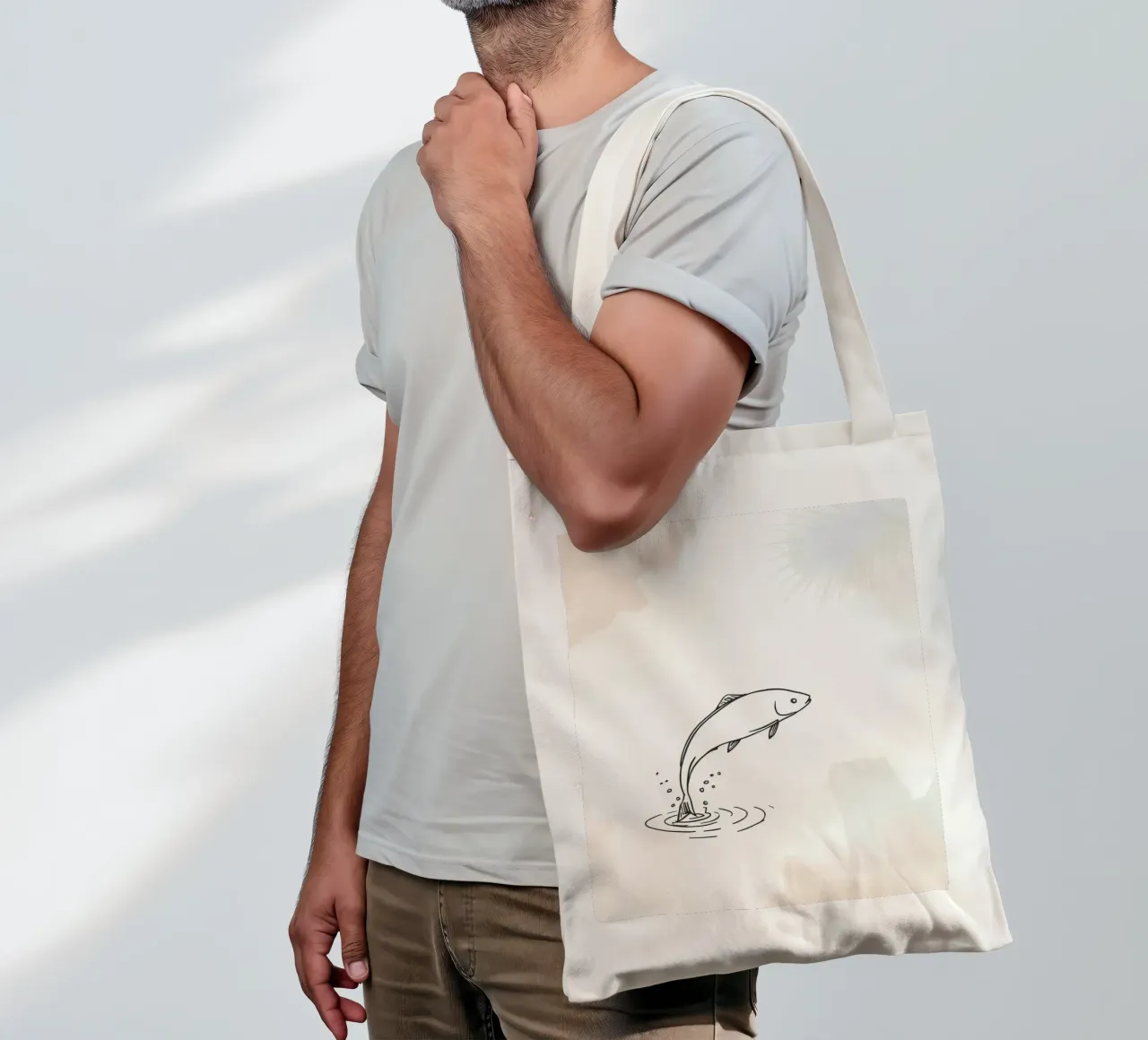 Sketch of a fish leaping from water, with rings and splashes tote bag by DesignDoodle
