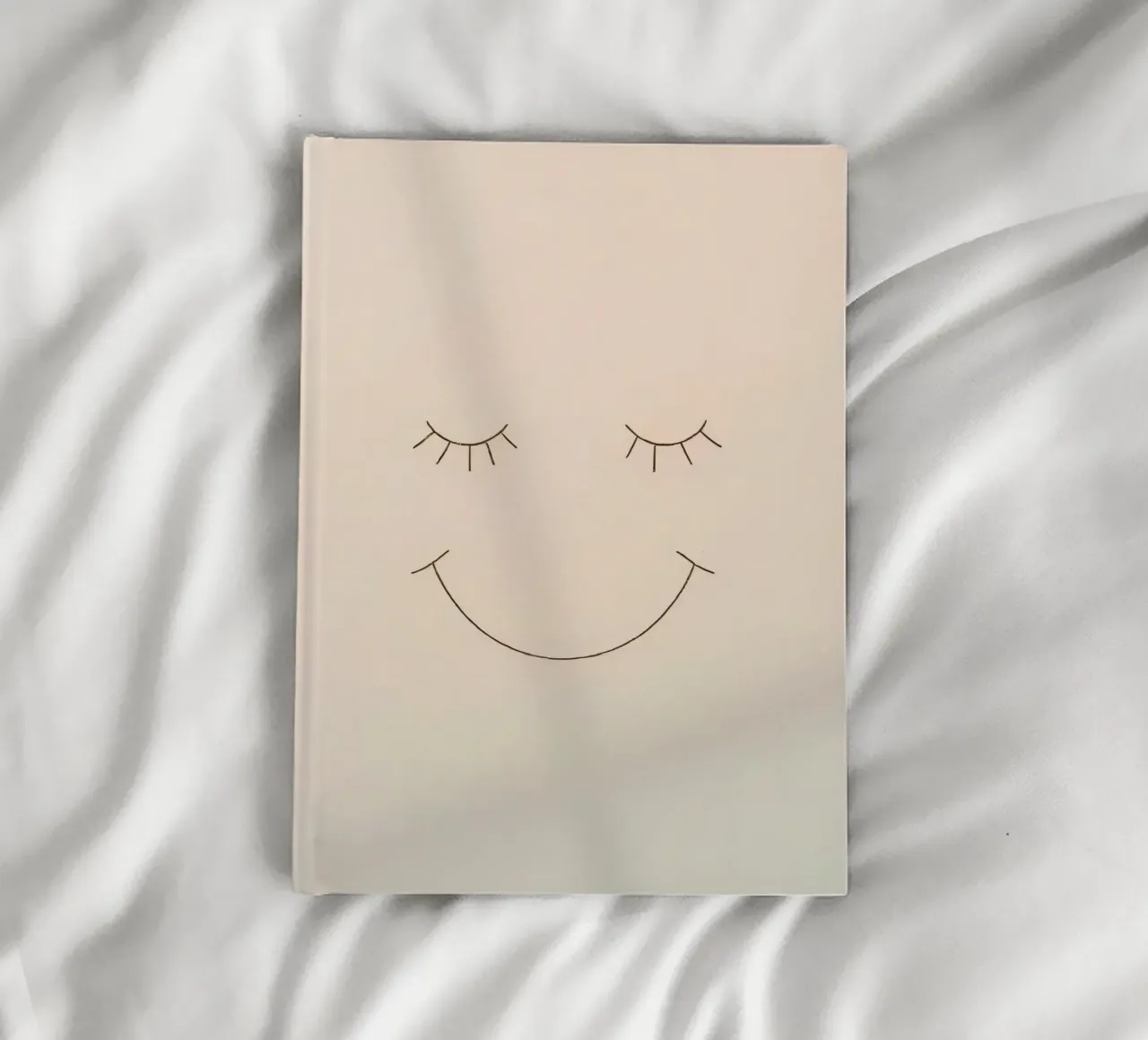 Simple drawing of a face with closed eyes and a smile notebook by DesignDoodle